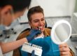 Dentist checking teeth enamel